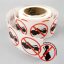 Bobine 500 étiquettes transparentes femme enceinte barrée